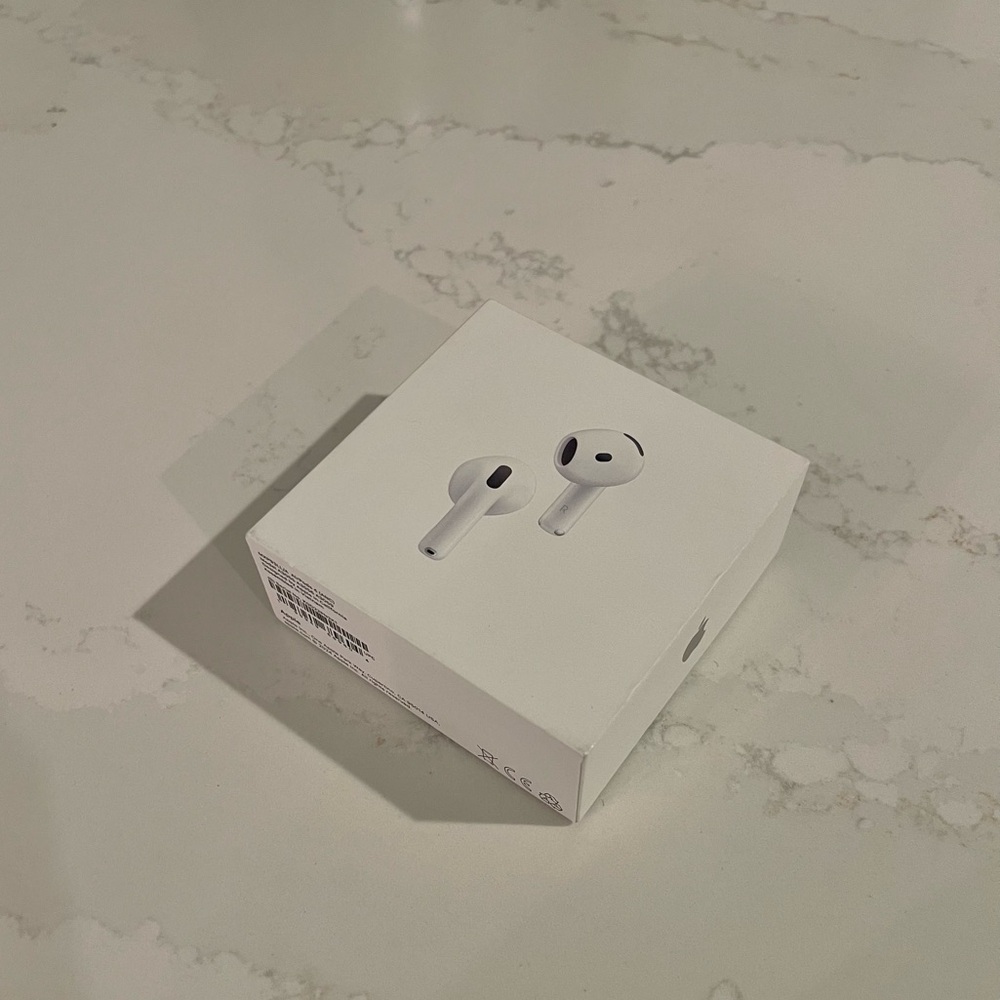 Apple AirPods with Charging Case - White